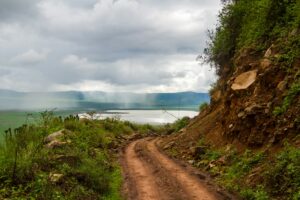 Closeup shot of a mountain road in the cloudy crater of the Ngorongoro National Park, Tanzania